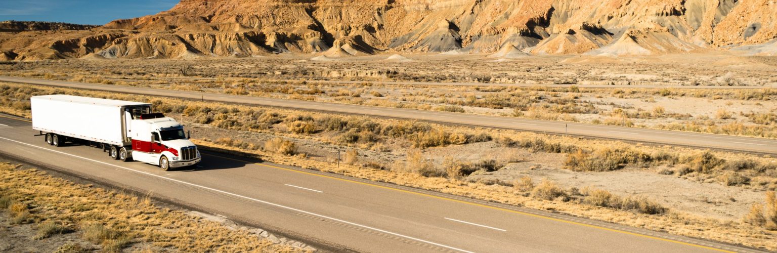 A trucker navigates this Utah highway in his big rig